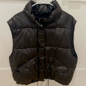H&M Black Vest. Has buttons, a zipper, and waist is adjustable!
